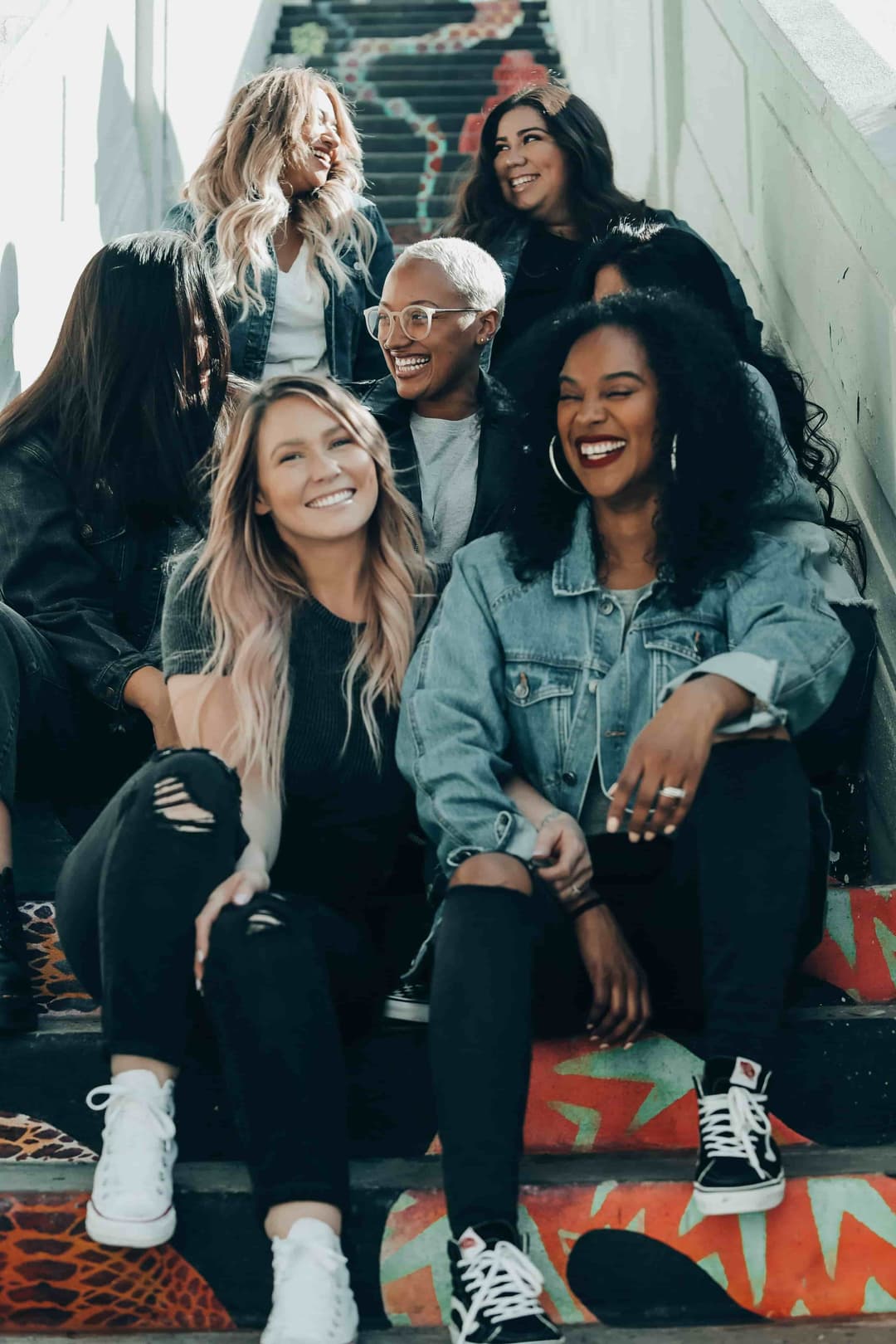 A group of joyful women interacting together